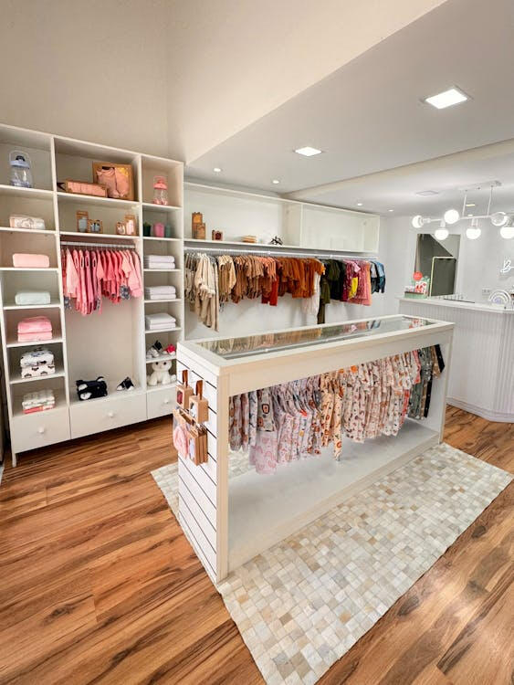 Calm A boutique interior with clothing items neatly organised and displayed